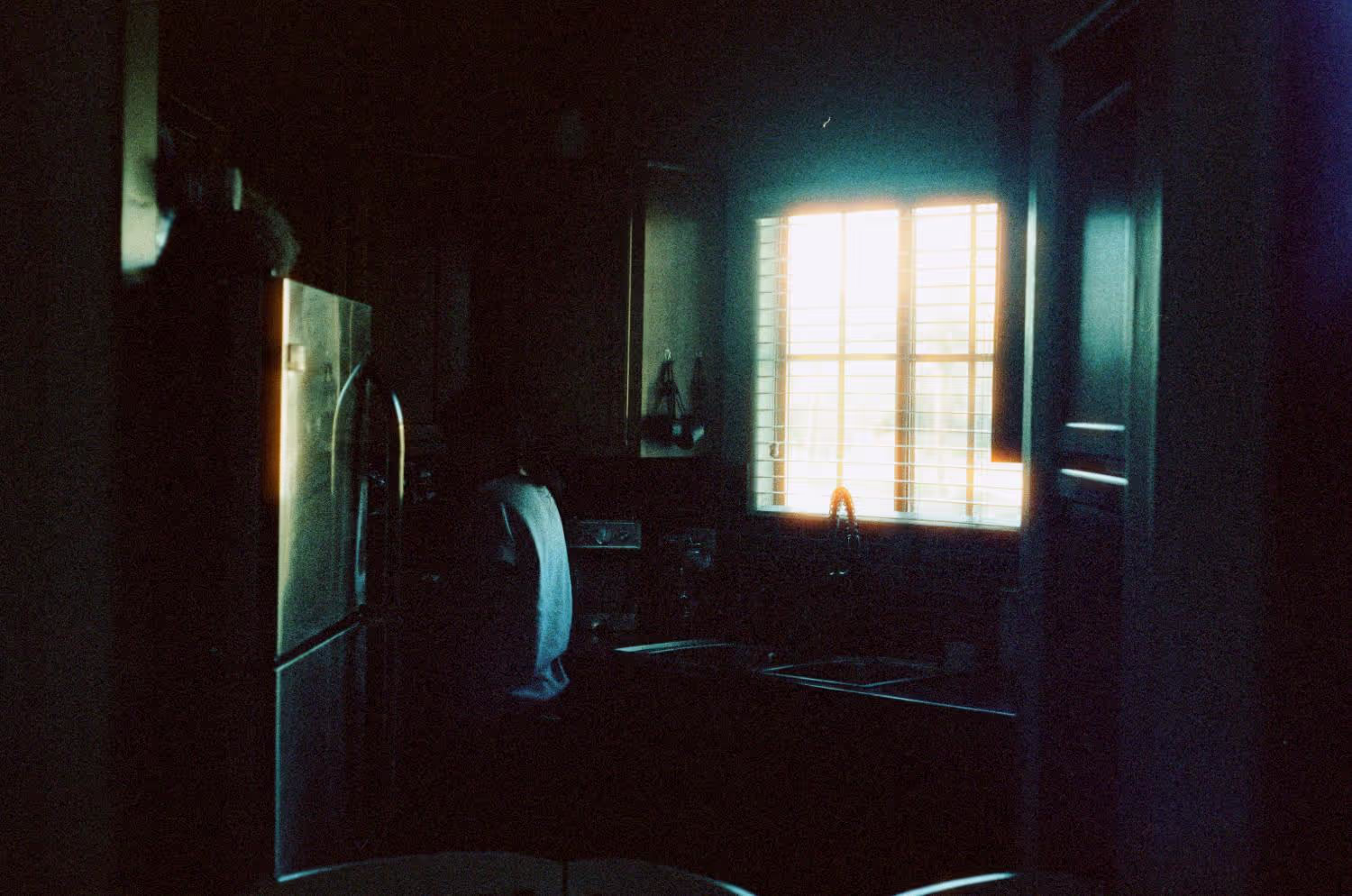 Halation in motion picture film. Red-orange highlight glow around bright areas in images are caused by optical halation which can be simulated with ofx plugins or photo editors