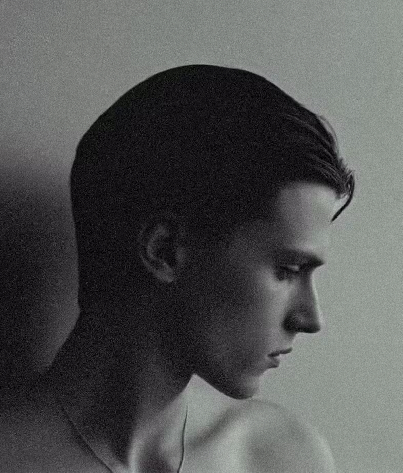 Monochrome high-resolution male portrait, soft tonal transitions and fine grain edited with Color.io black & white film emulation